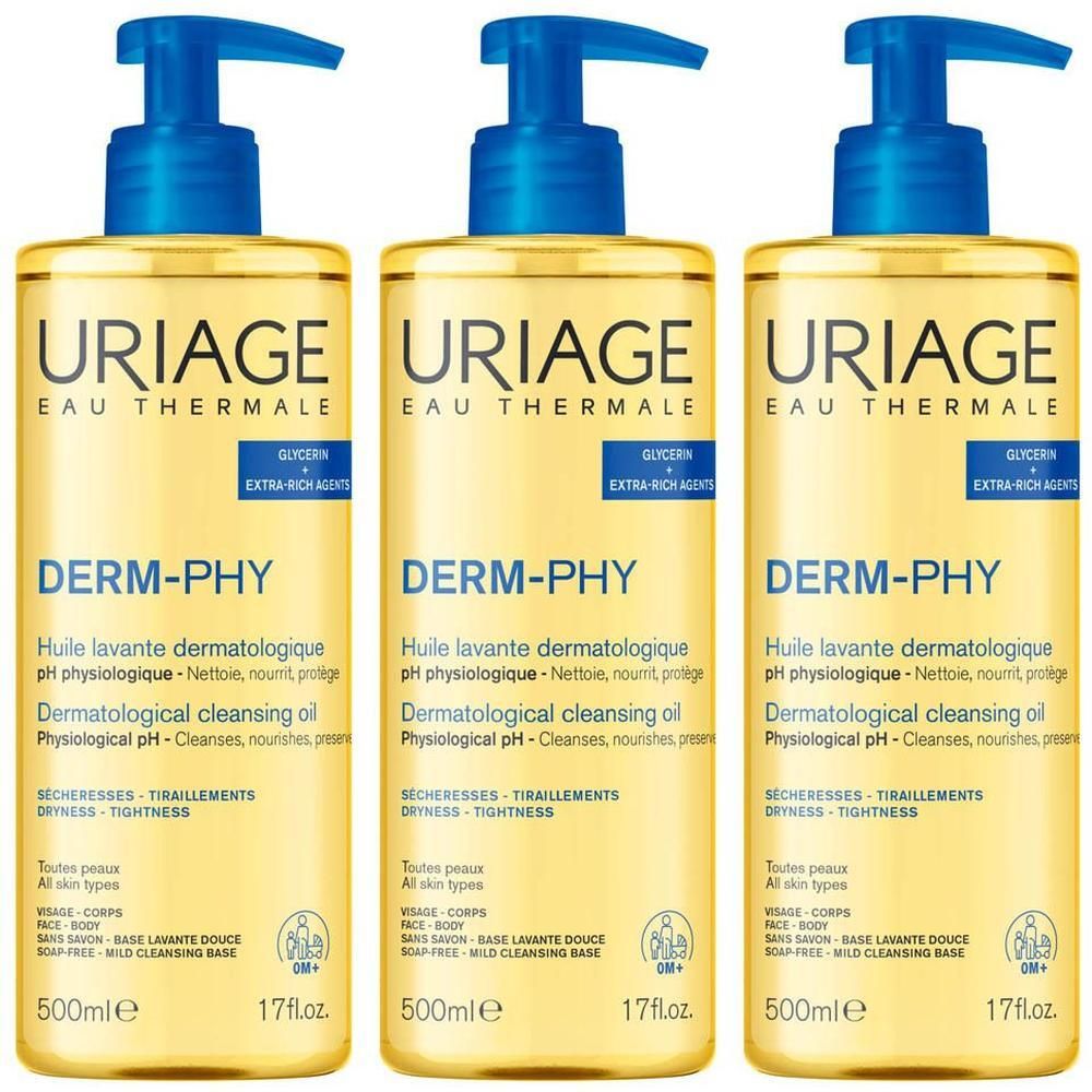 Trois flacons d'huile lavante Uriage Eau Thermale Derm-Phy avec distributeurs à pompe. Flacons jaunes avec pompes bleues.