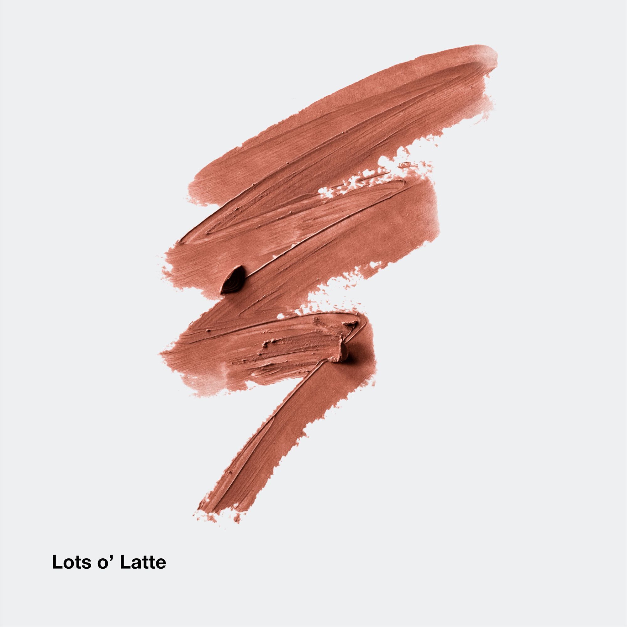 Lippenstift-swatches in de kleur Lots O'Latte op grijze achtergrond.