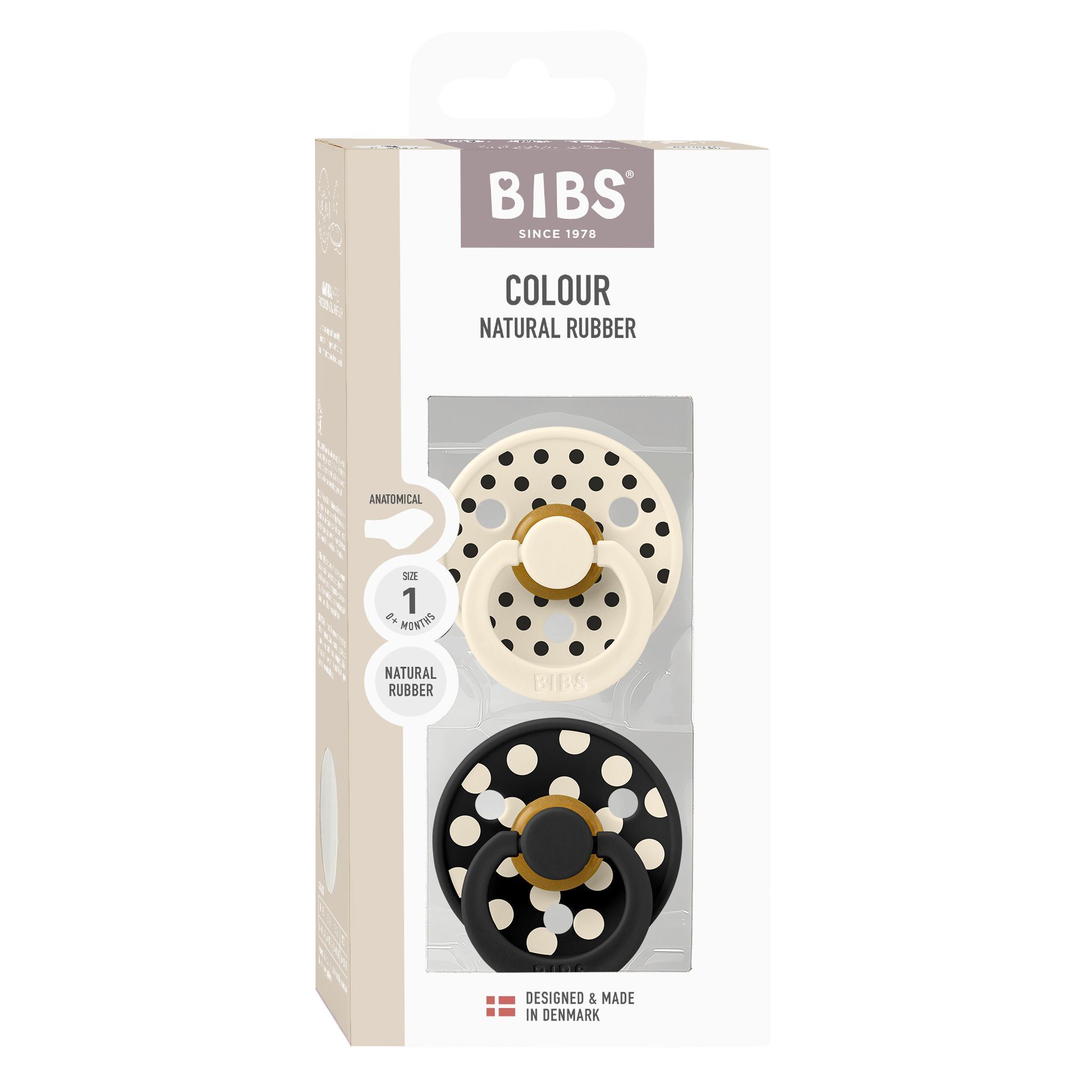 Coffret de sucettes Bibs, une crème et une noire à pois, dans son emballage.