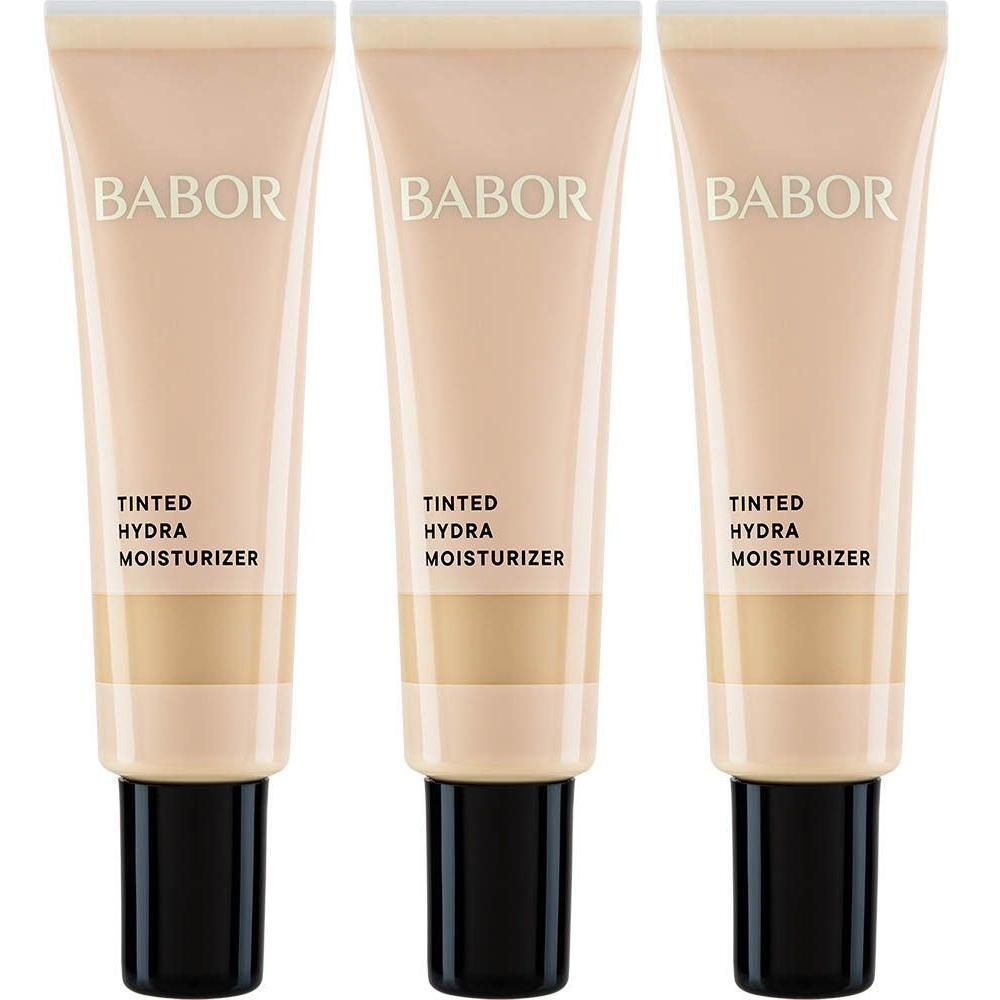 Trois tubes de BABOR Tinted Hydra Moisturizer avec bouchon noir.