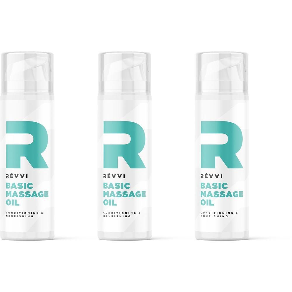 Drie witte flacons met pompdosering, elk met het logo en de tekst "RÉVVI BASIC MASSAGE OIL".