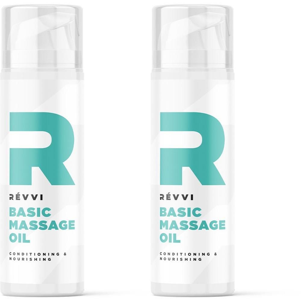 Twee witte flacons met pompdosering die RÉVVI Basic Massageolie bevatten.