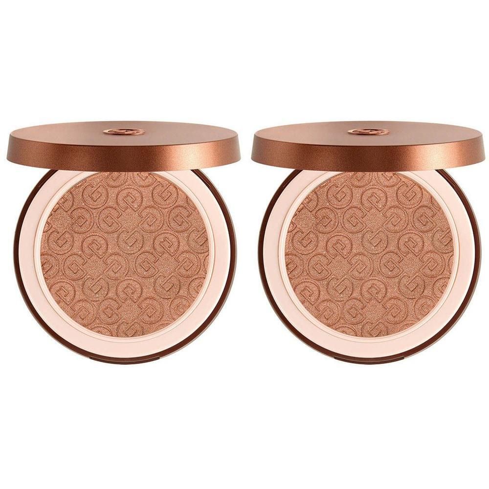 Twee geopende bronzing poederdoosjes met reliëfpatroon.