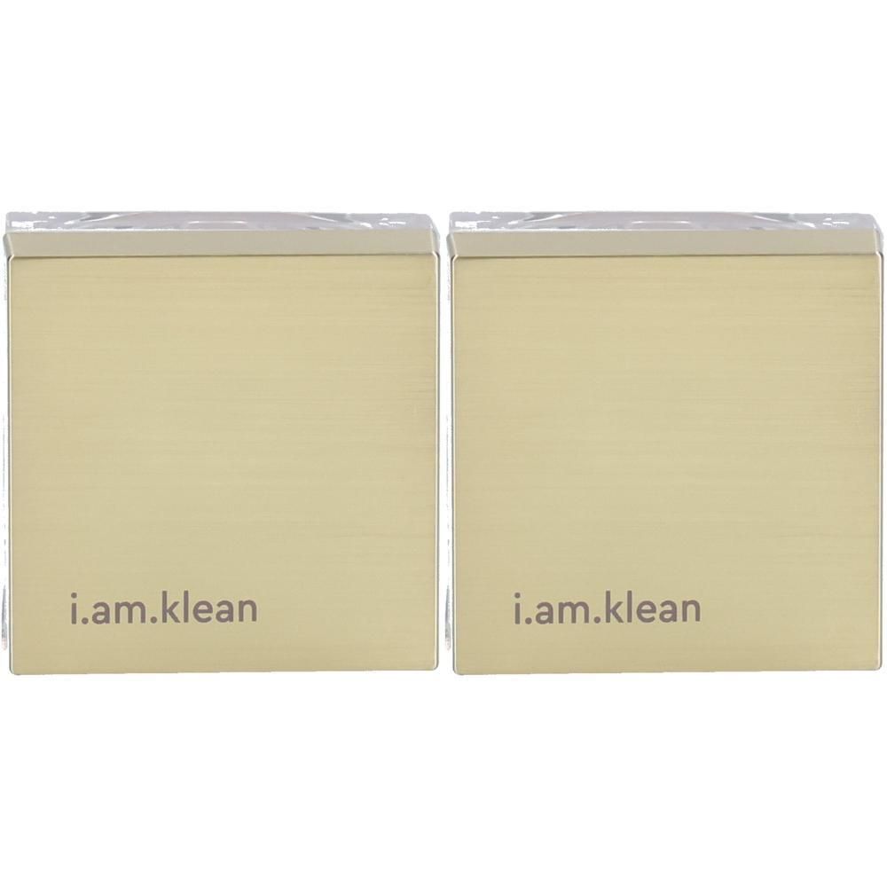 Deux contenants dorés avec couvercle argenté, chacun marqué "i.am.klean".