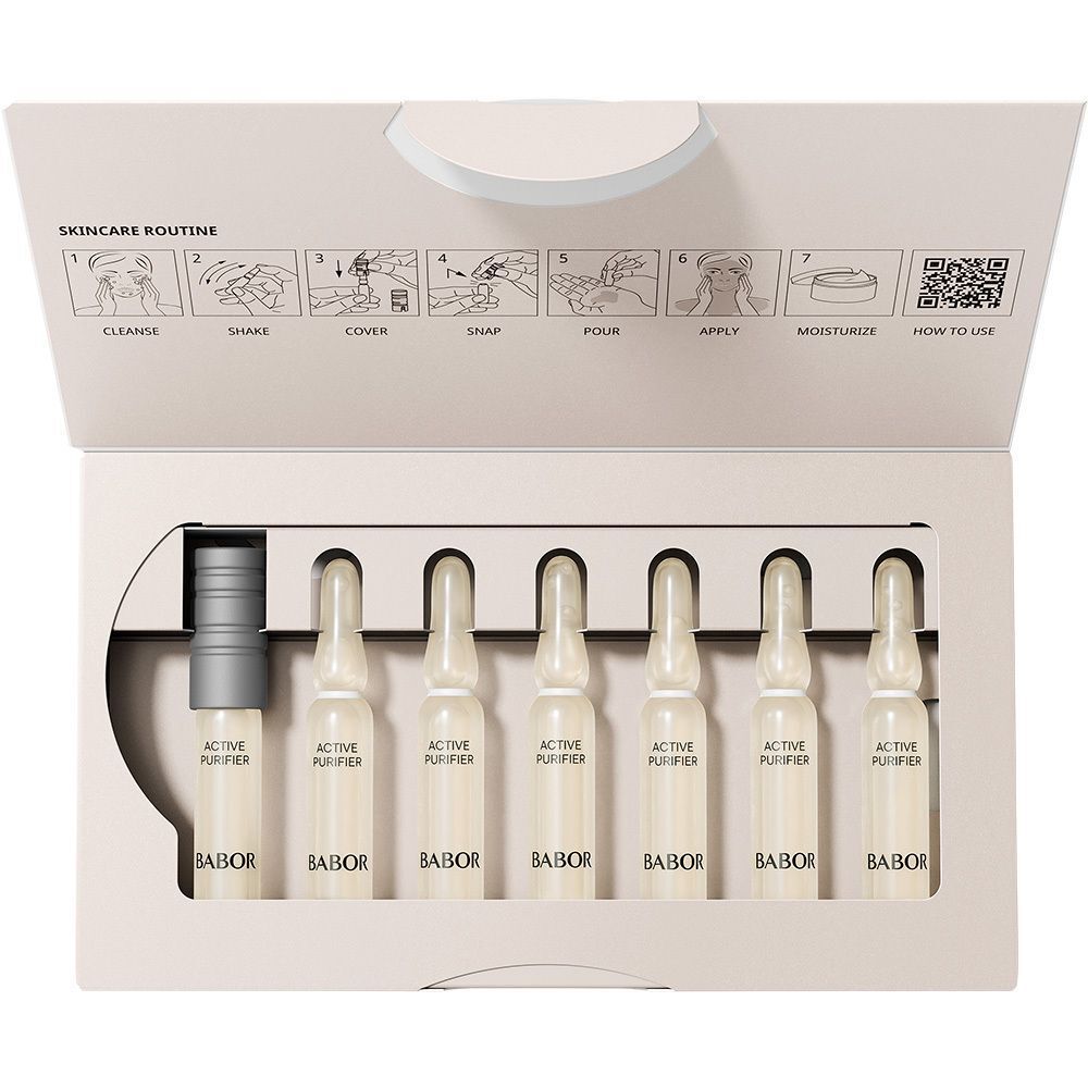 Emballage BABOR ouvert avec sept ampoules Active Purifier et un applicateur.