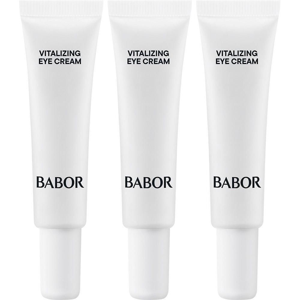 Trois tubes blancs de Babor Vitalizing Eye Cream avec inscription noire.
