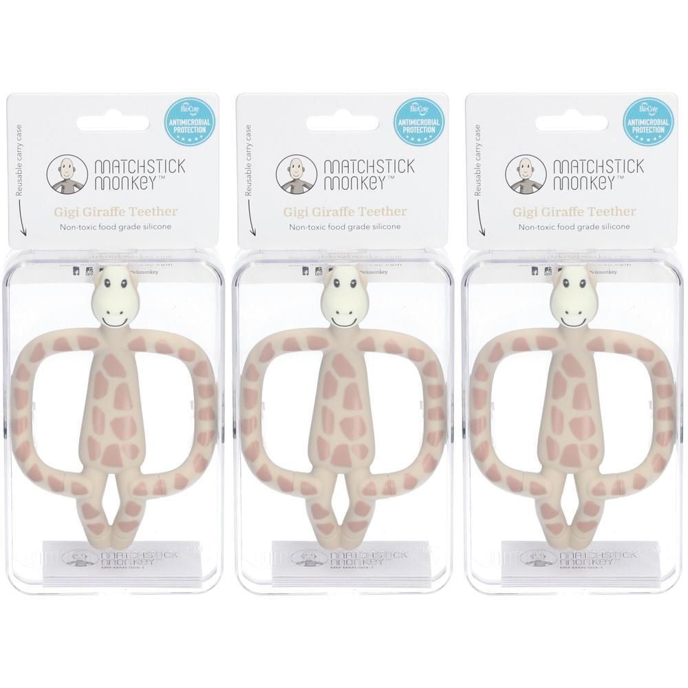 Trois anneaux de dentition girafe emballés. En silicone sans BPA, beige avec taches roses.