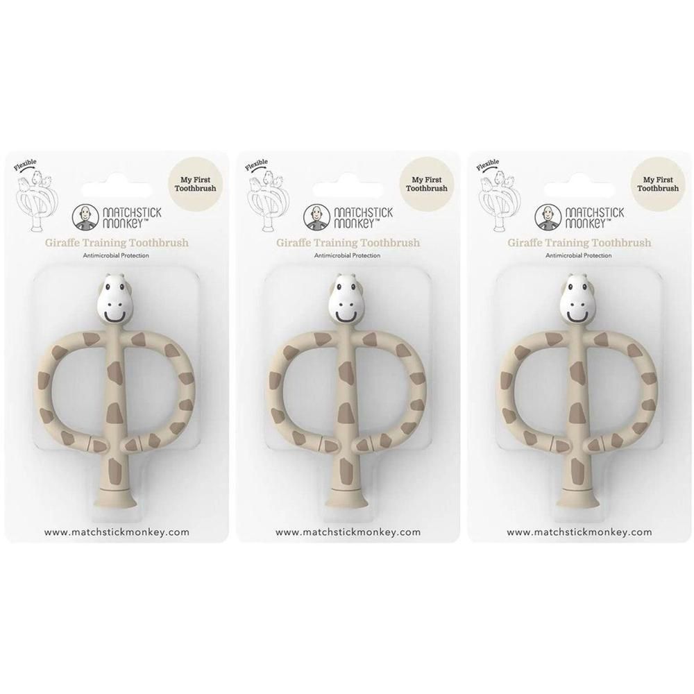 Trois brosses à dents girafe pour bébé sous emballage. Beige avec taches marron, flexible.