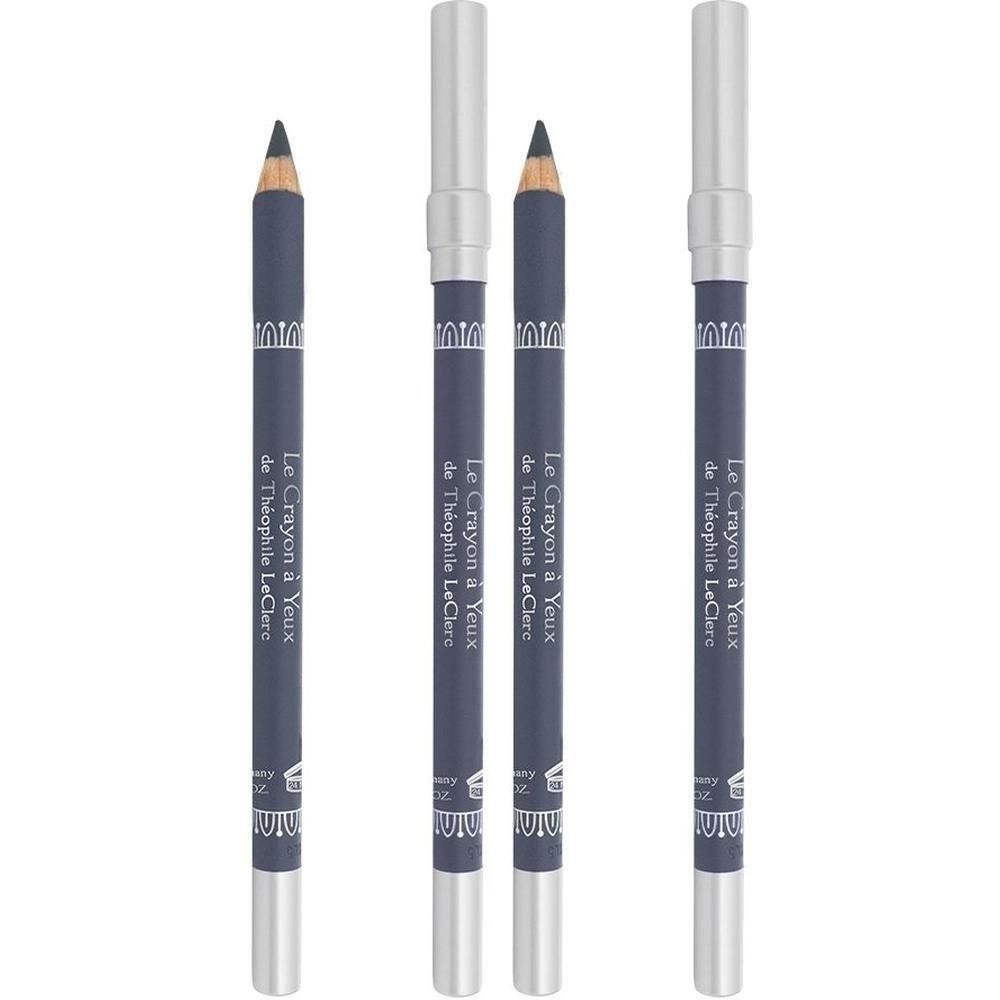 Quatre crayons pour les yeux gris foncé avec des capuchons argentés et des accents argentés. Un est ouvert.