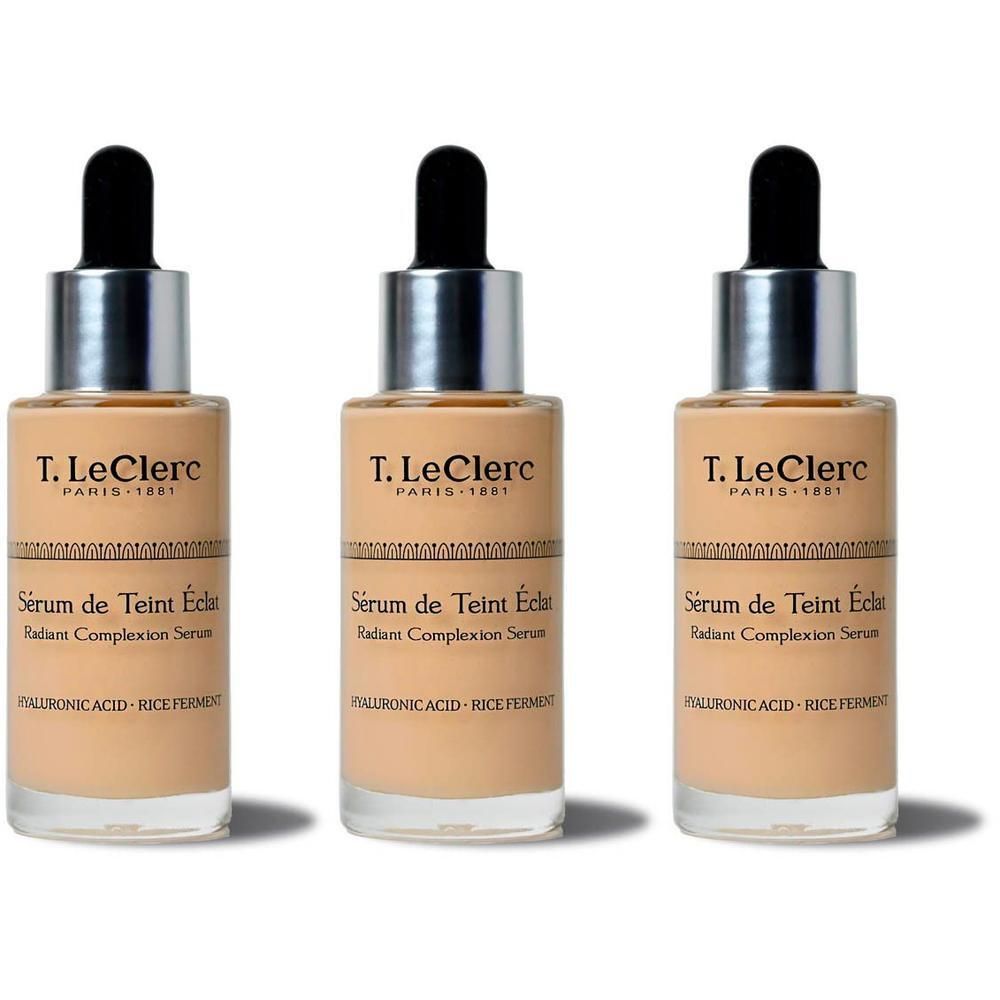 Trois flacons de T. LeClerc Sérum de Teint Éclat avec applicateur compte-gouttes.
