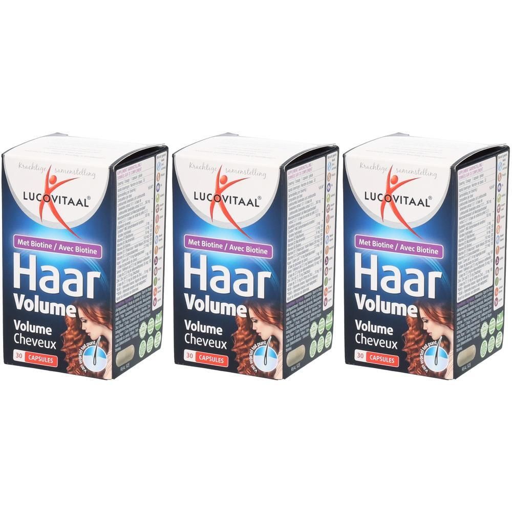 Trois boîtes de gélules Lucovitaal Haar Volume à la biotine. Emballage cartonné avec informations produit et image d'une femme aux cheveux volumineux.