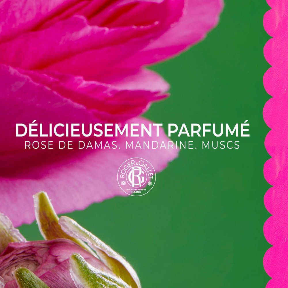 Gros plan d'une rose avec texte sur les notes parfumées : Rose, Mandarine, Muscs.
