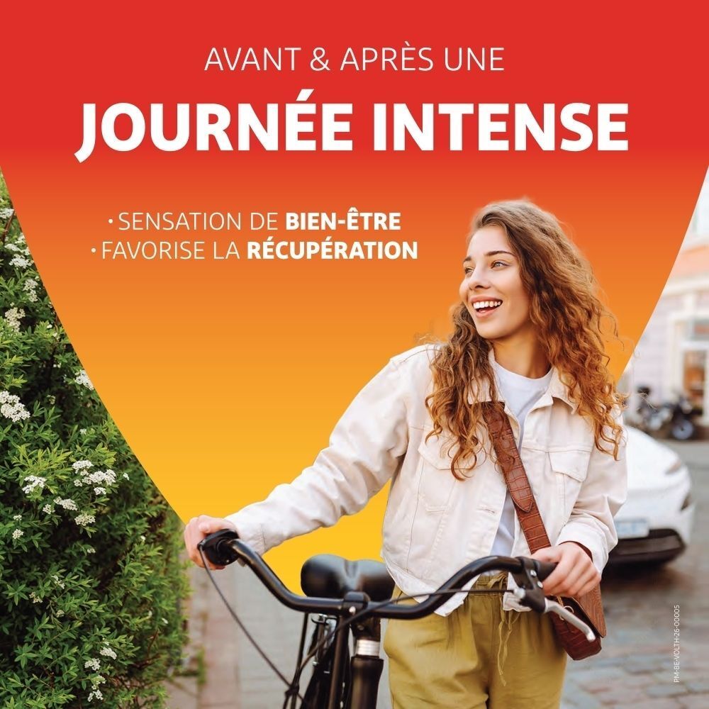 Femme à vélo, souriante. VoltaHeat pour le bien-être et la récupération après une journée intense.