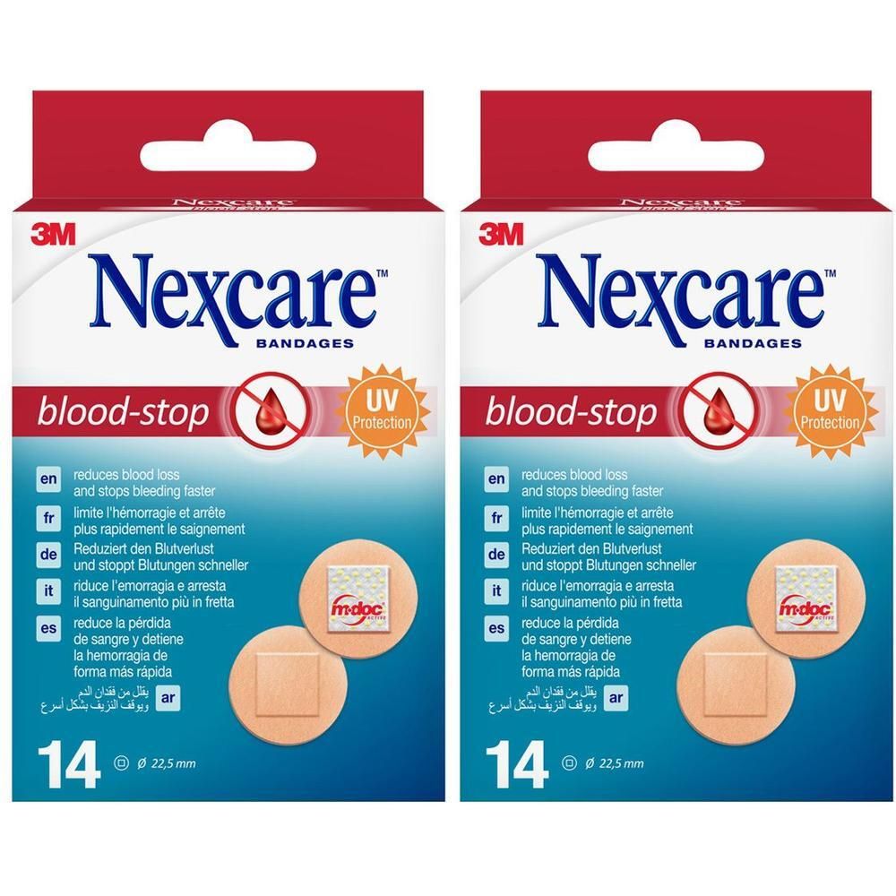 Deux paquets de pansements Nexcare blood-stop, 14 pansements par paquet, 22,5 mm de diamètre.