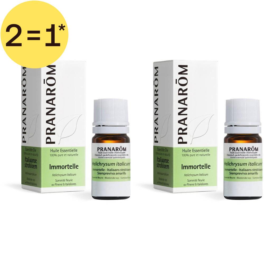 Twee flesjes Pranarôm Immortelle etherische olie. Witte dozen met productinformatie.
