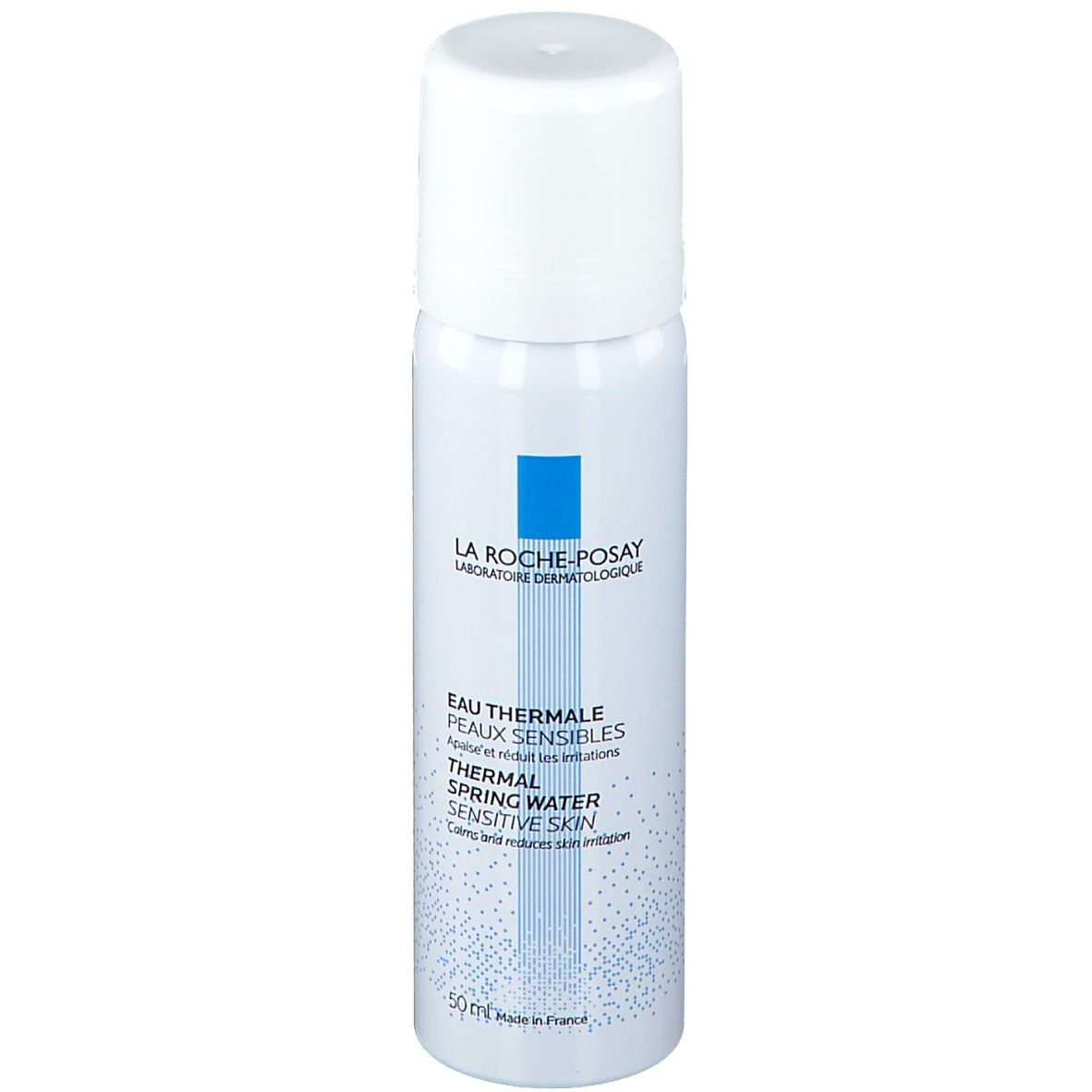 Spray blanc avec logo bleu. Texte: Eau Thermale, Peaux Sensibles, Thermal Spring Water, Sensitive Skin. 50 ml.