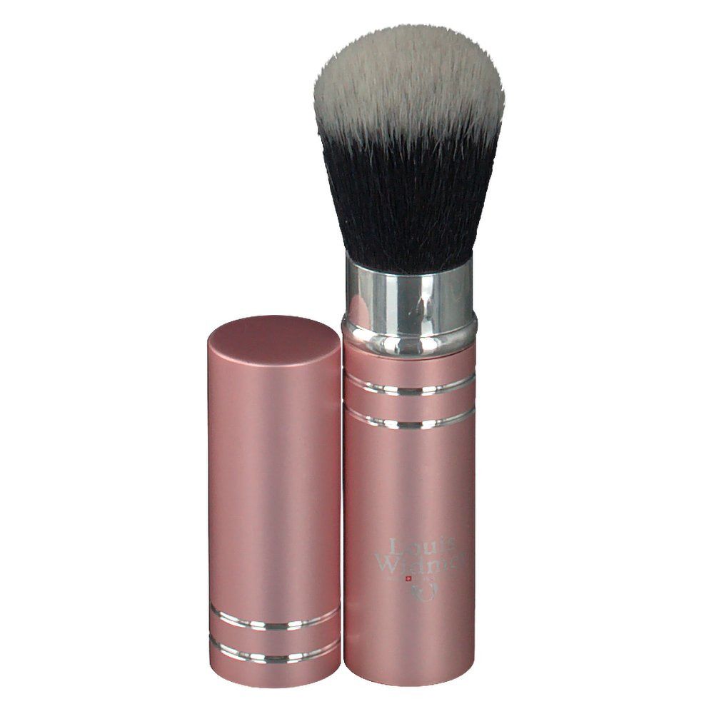 Pinceau à poudre avec étui rose et tête de brosse noire/blanche. Étui ouvert, couvercle à côté.