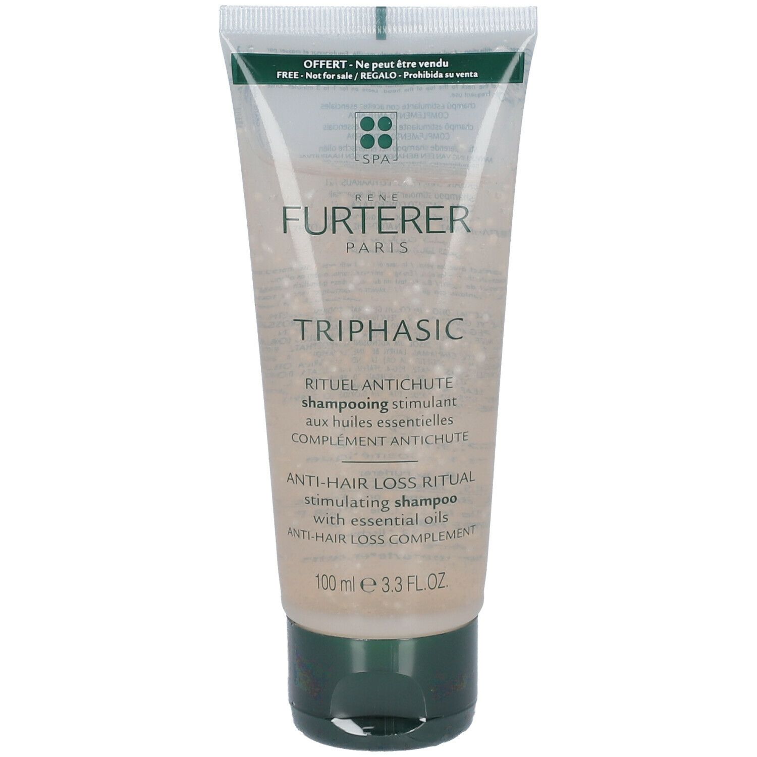 Tube stimulerende shampoo. Merk: Rene Furterer. Tekst: Triphasic, Anti-haaruitval ritueel. 100 ml. Groen-transparante verpakking.