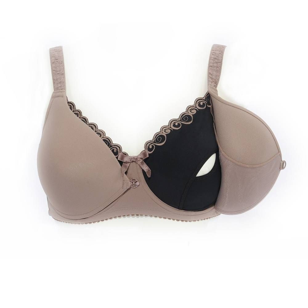 Beige voedingsbeha met zwarte inzet en kant. Strik tussen de cups. Verstelbare bandjes.