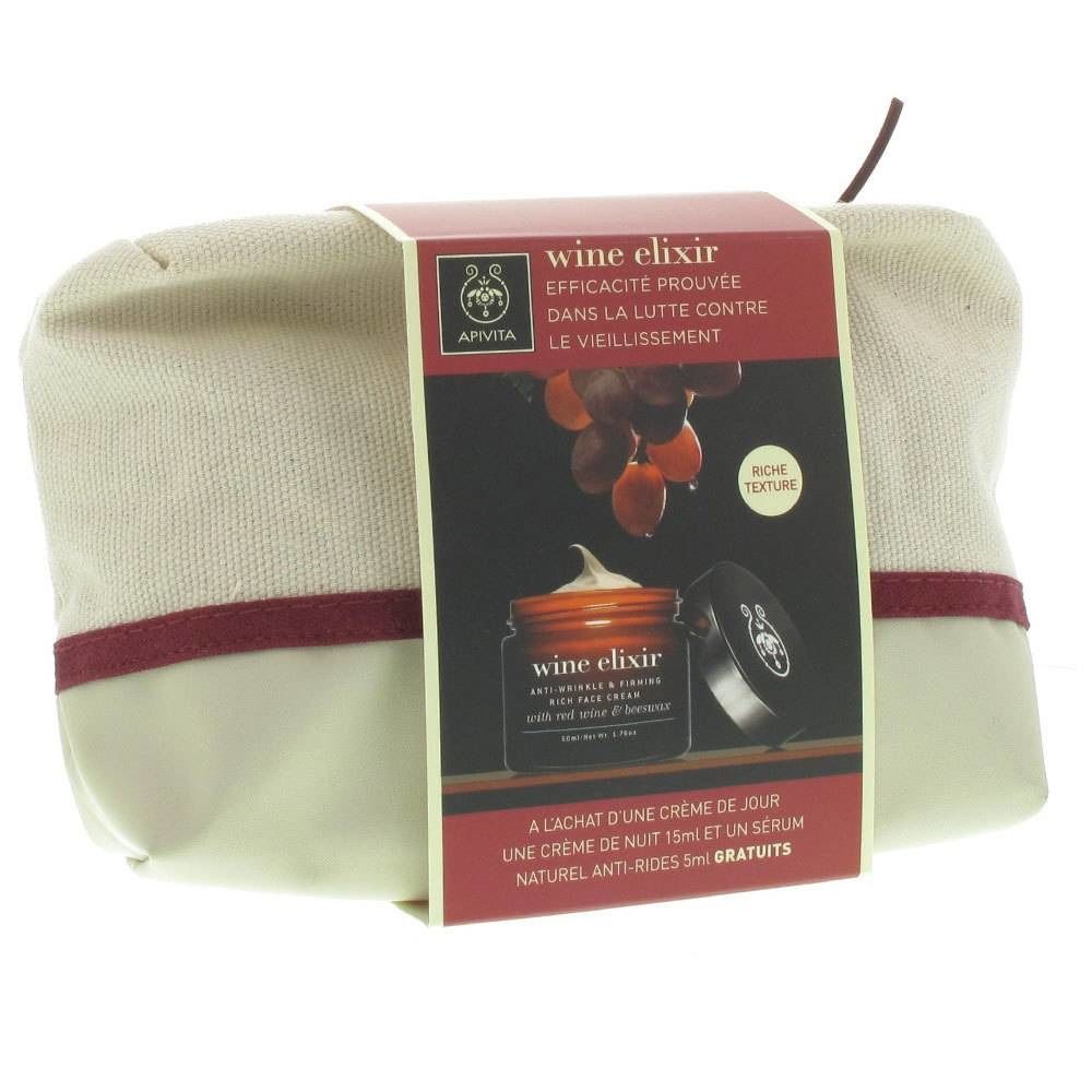 Trousse beige avec bande rouge. Emballage produit avec texte 'wine elixir' et illustration de raisins.