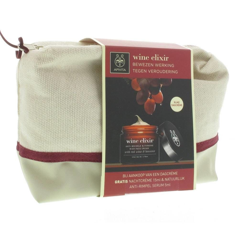 Trousse beige avec bande rouge. Emballage produit avec texte 'wine elixir' et illustration de raisins.