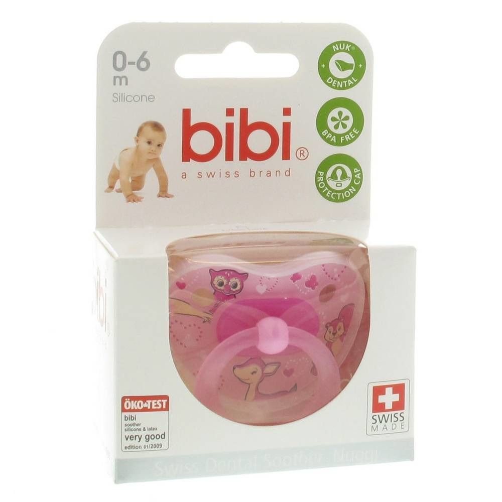 Roze fopspeen in verpakking. Opschriften: bibi, 0-6m, BPA-vrij, NUK Dental, ÖKO-TEST. Zwitsers kruis. Motieven: hert, uil.