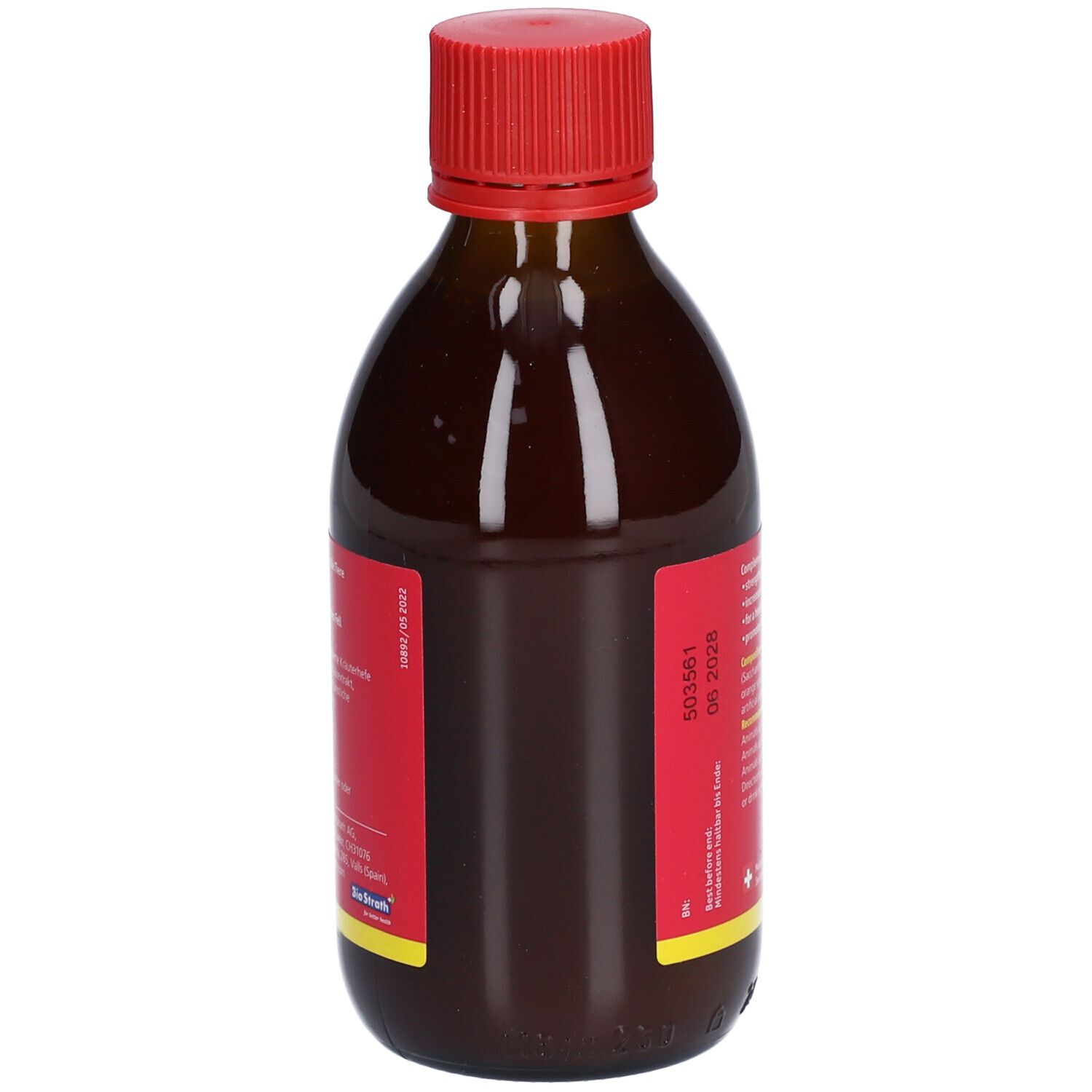 Vue arrière d'une bouteille en verre brun avec bouchon rouge. Étiquette rouge avec texte. Date de péremption: 06 2026.