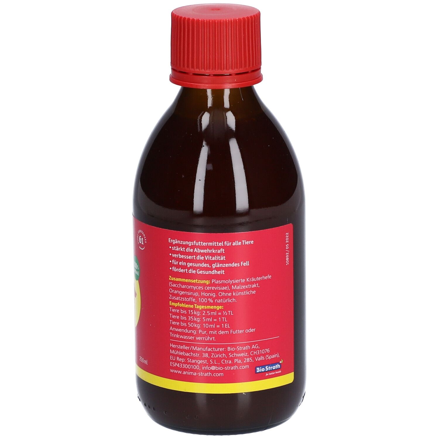 Bouteille en verre brun avec bouchon rouge. Étiquette rouge avec texte et logo jaune. Aliment complémentaire pour animaux. 250ml.