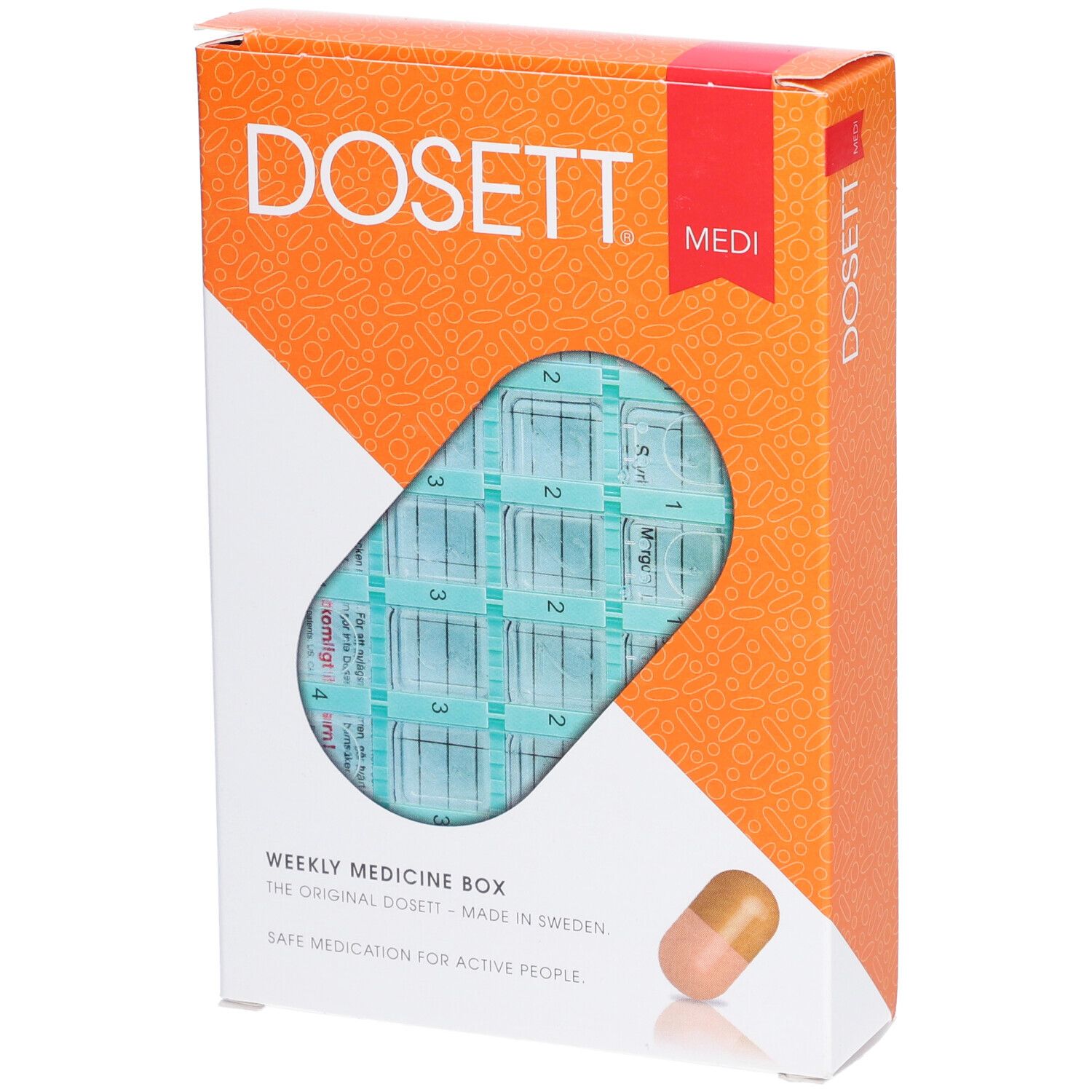 Boîte à pilules dans son emballage. Visible : DOSETT, Medi. Boîte hebdomadaire avec compartiments. Emballage orange et blanc. Icône de pilule.
