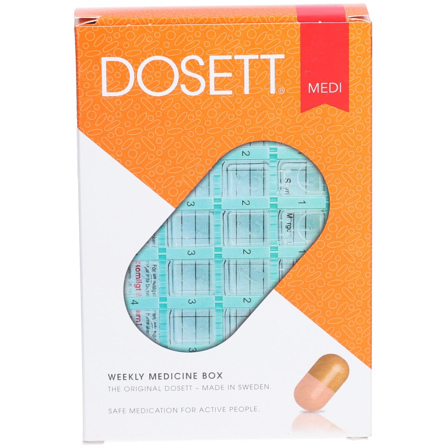 Boîte à pilules dans son emballage. Visible : DOSETT, Medi. Boîte hebdomadaire avec compartiments. Emballage orange et blanc. Icône de pilule.
