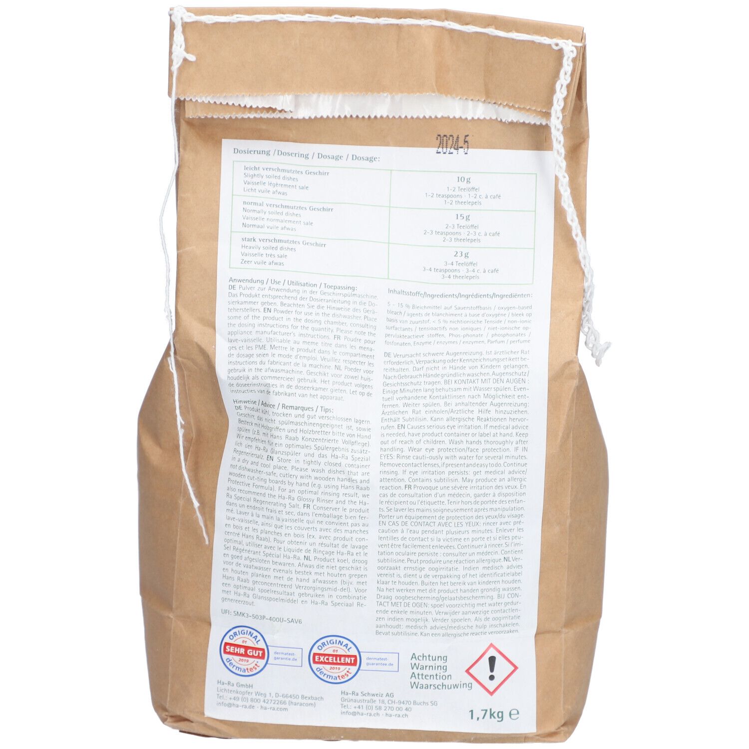 Achterkant van de vaatwasmiddelzak. Bruine zak met witte tekst. Bevat tekst, logo's en waarschuwingen.