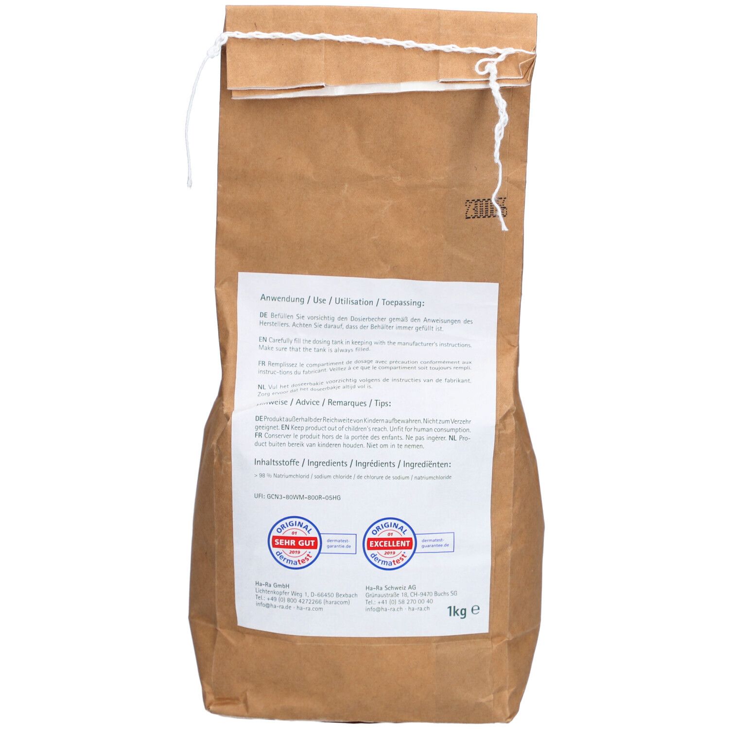 Dos du sac en papier brun. Texte en plusieurs langues. Sceaux : Très bien, Excellent. Poids : 1kg.