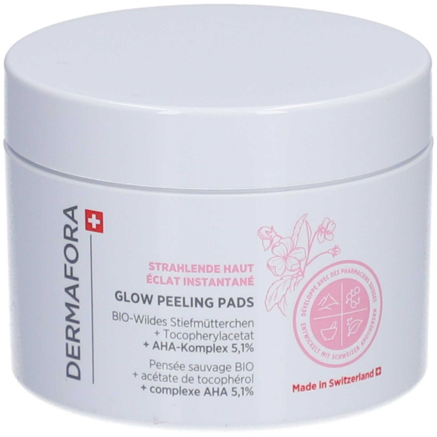 Witte pot met roze opdruk. Opschrift: Dermafora, Glow Peeling Pads. Met Zwitsers kruis.