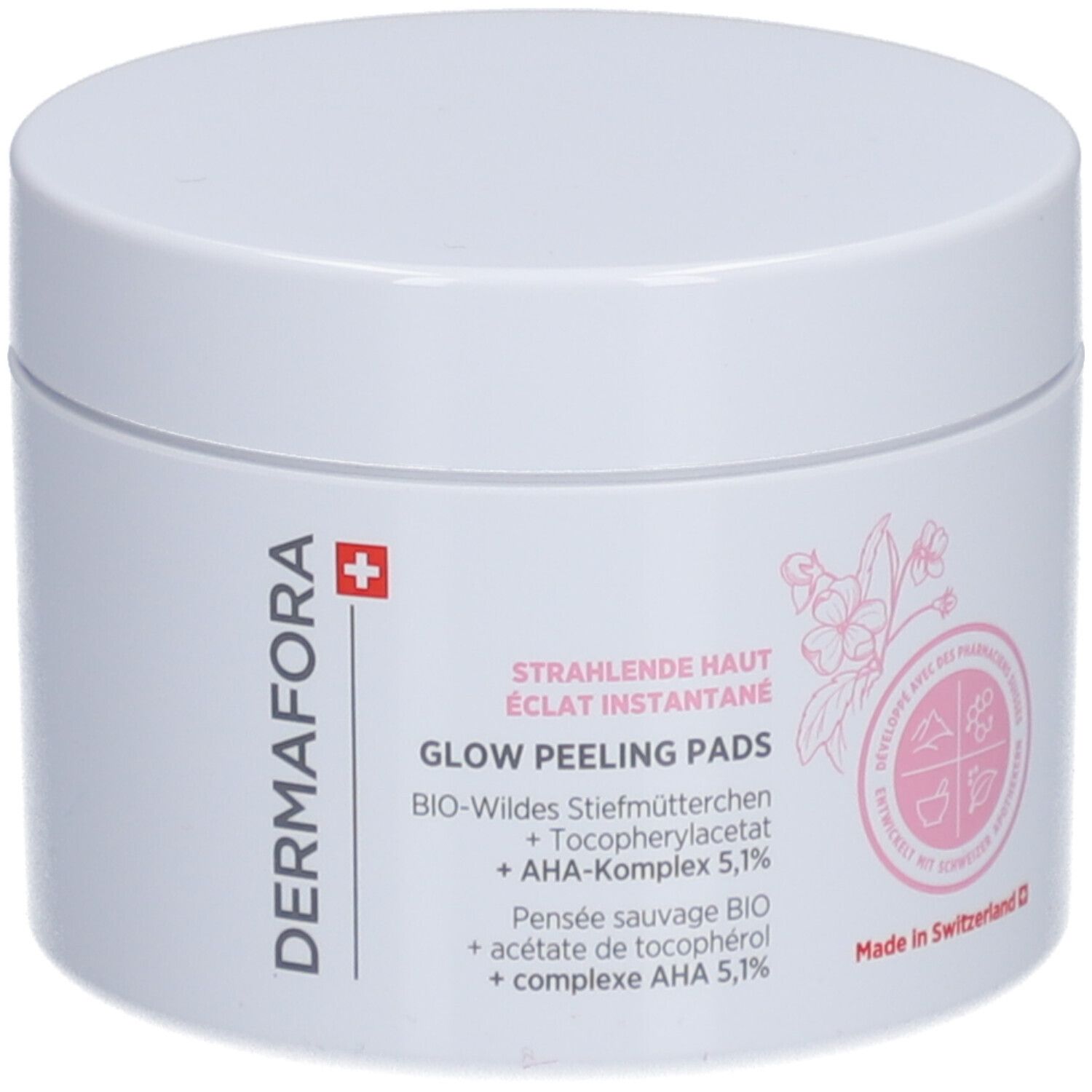 Witte pot met roze opdruk. Opschrift: Dermafora, Glow Peeling Pads. Met Zwitsers kruis.