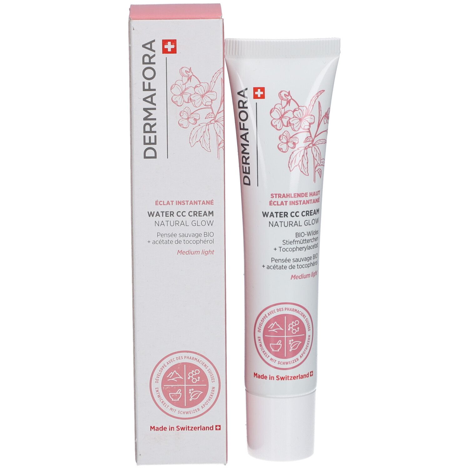 Productverpakking: tube en doos. Opschrift: Dermafora, Water CC Cream Natural Glow. Zwitsers kruis en bloemenmotief.