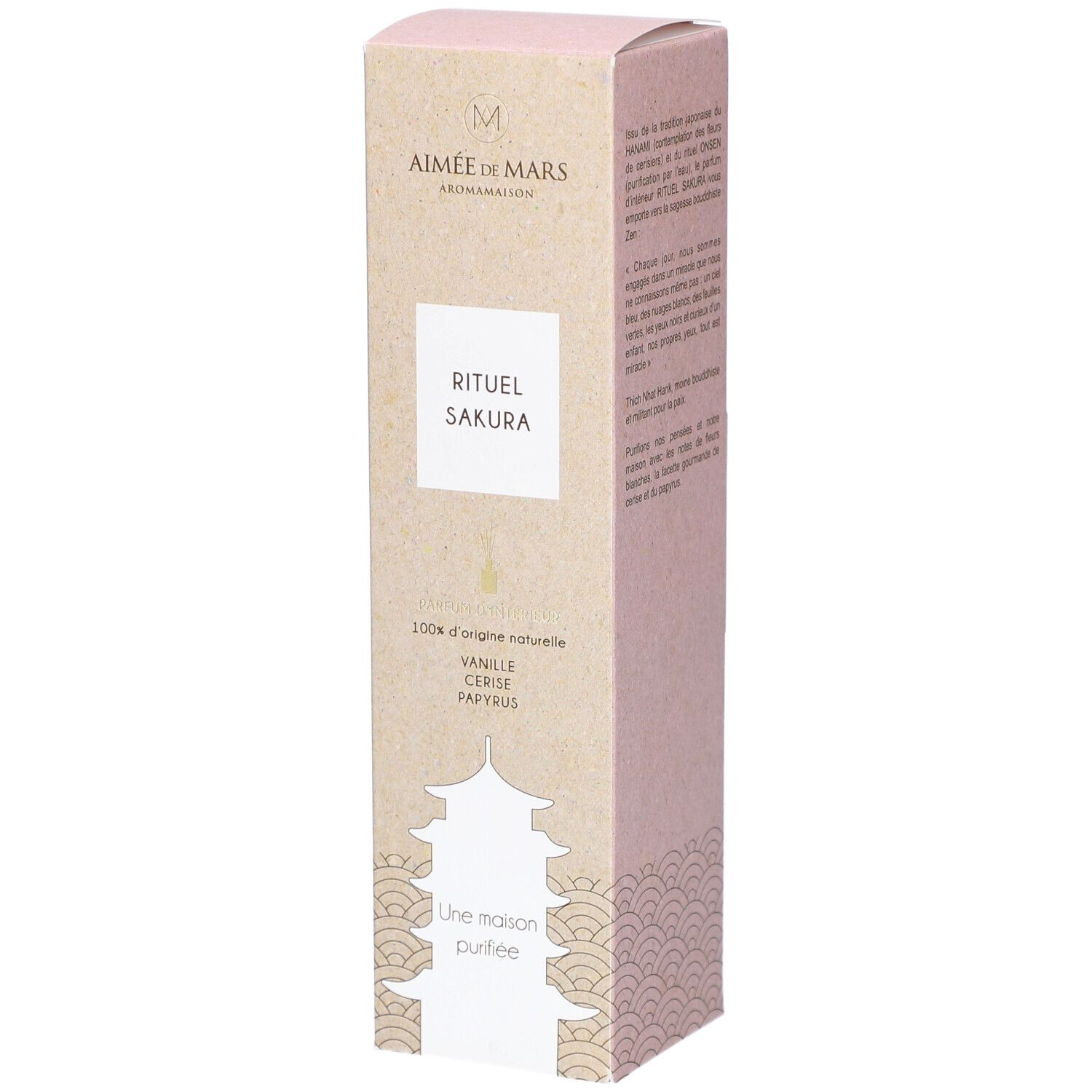 Kartonnen verpakking met productnaam "Rituel Sakura" en logo. Bevat geurstokjes. Roze en beige tinten.