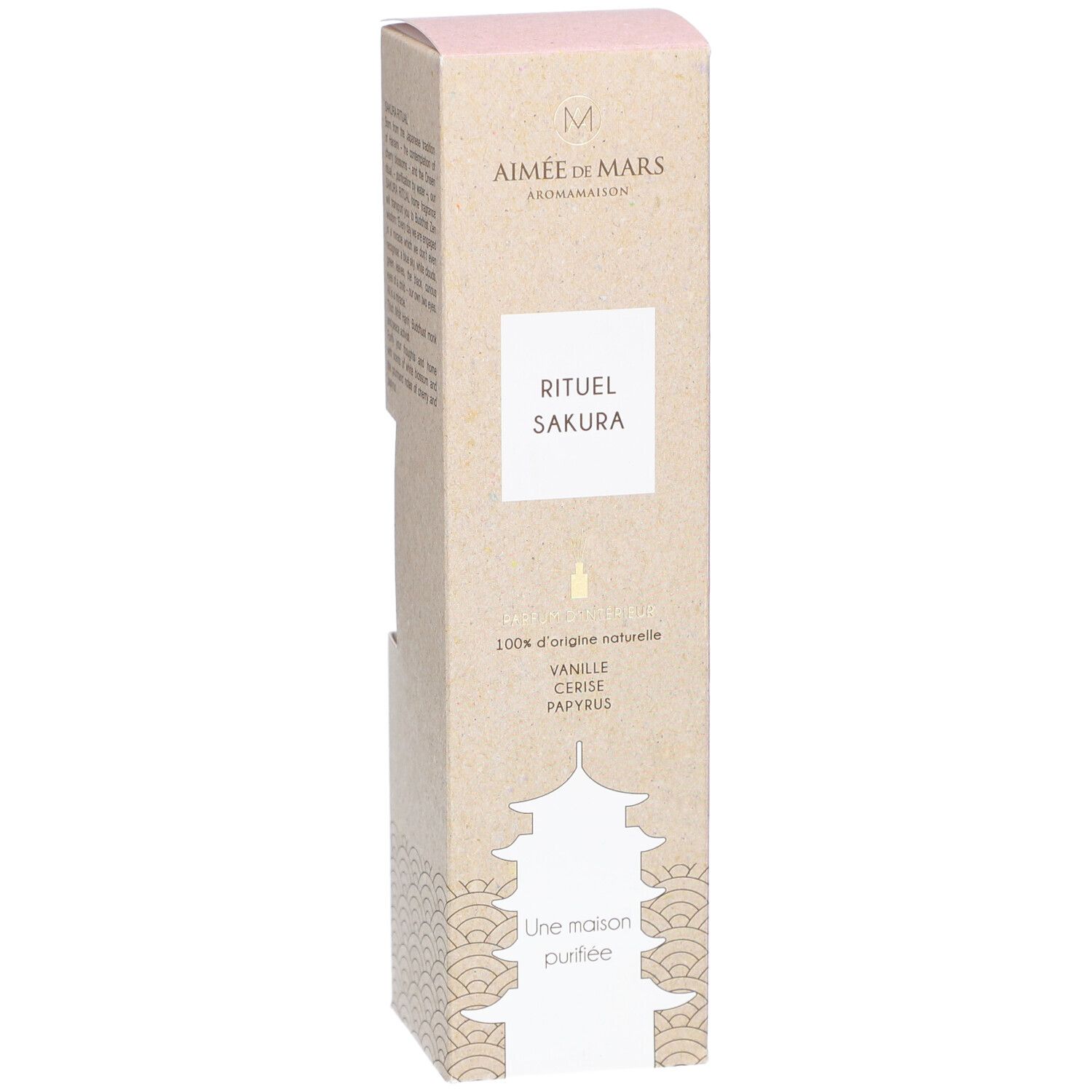 Kartonnen verpakking "Rituel Sakura" met logo en informatie. Beige en roze tinten. Close-up.
