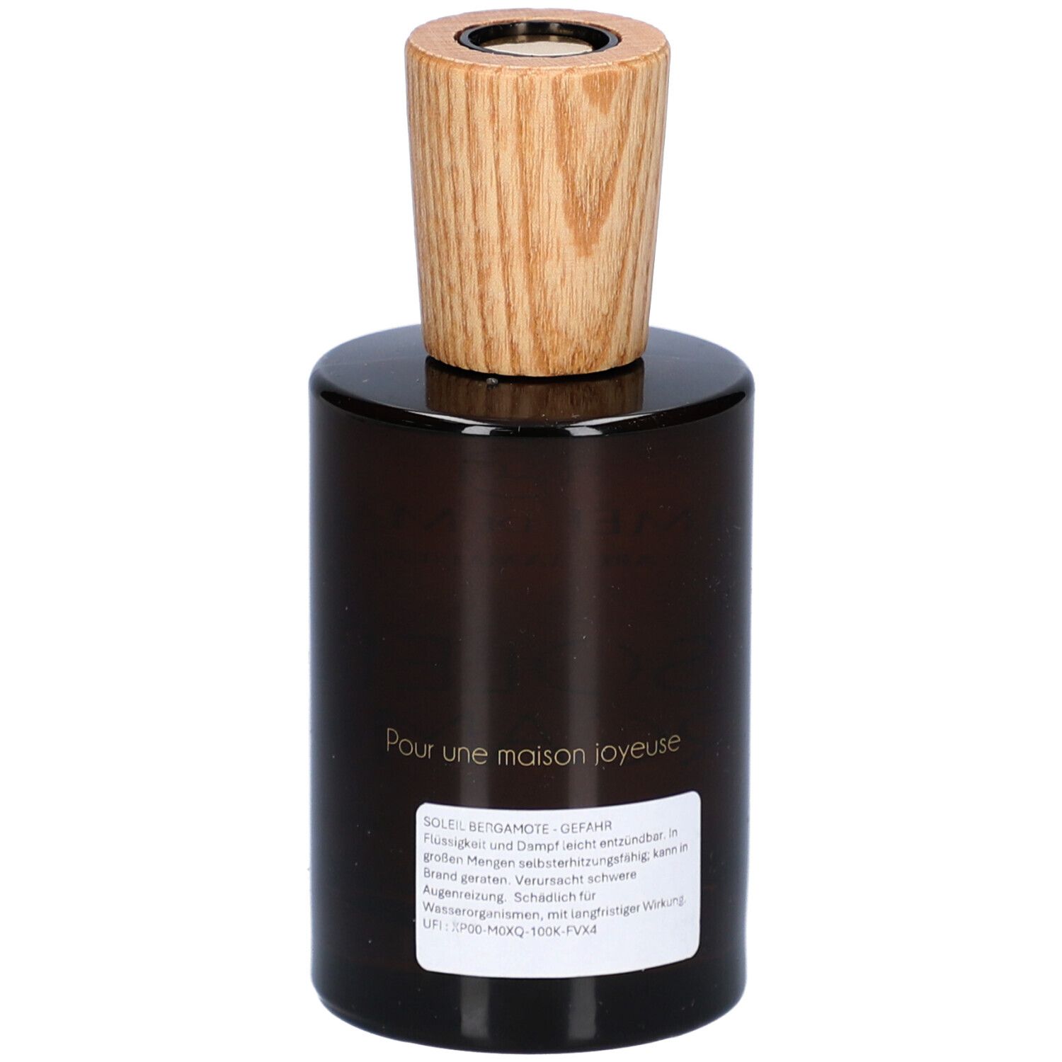 Bruine glazen fles met houten dop. Etiket op de achterkant met tekst. Opschrift: Pour une maison joyeuse.