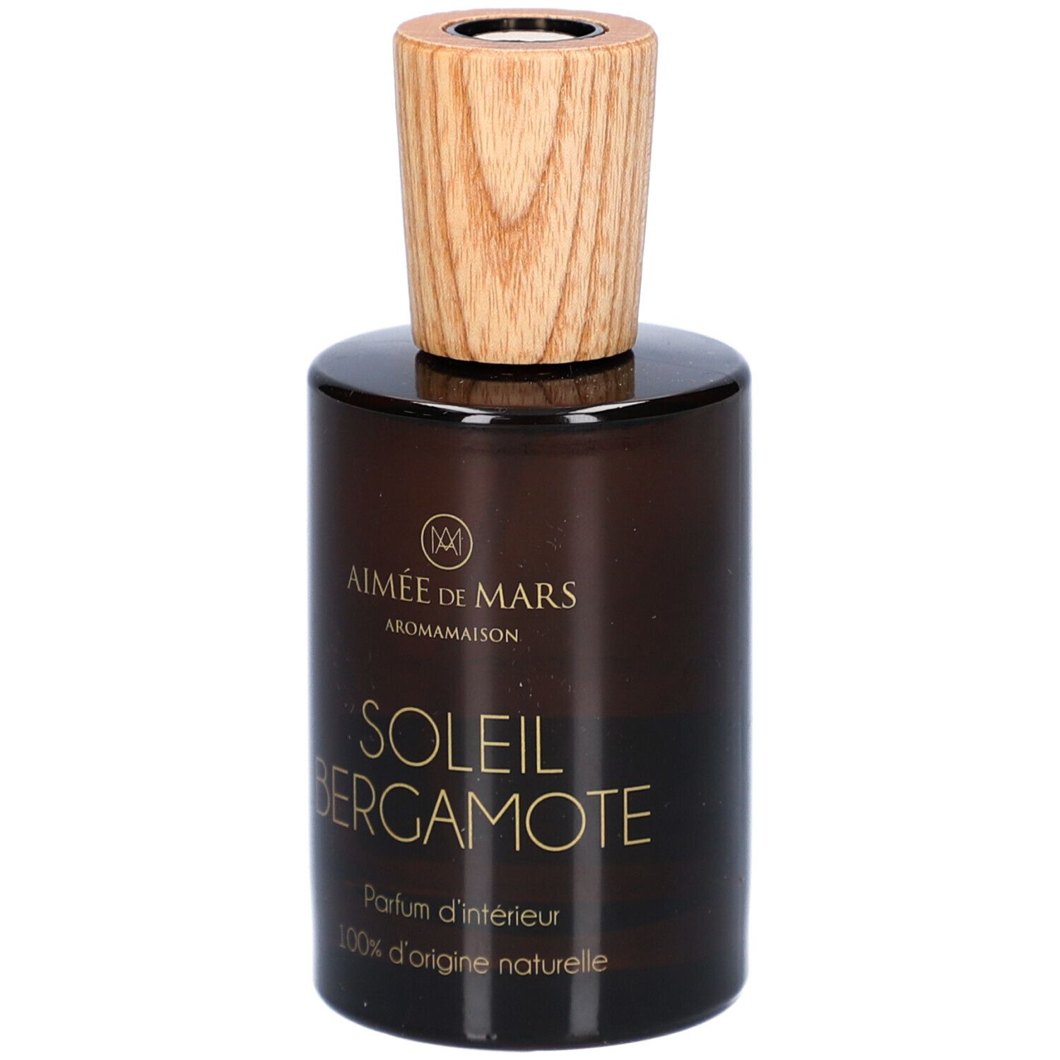 Bruine glazen fles met houten dop. Opschrift: AIMEE DE MARS, SOLEIL BERGAMOTE, Parfum d'intérieur, 100% d'origine naturelle.