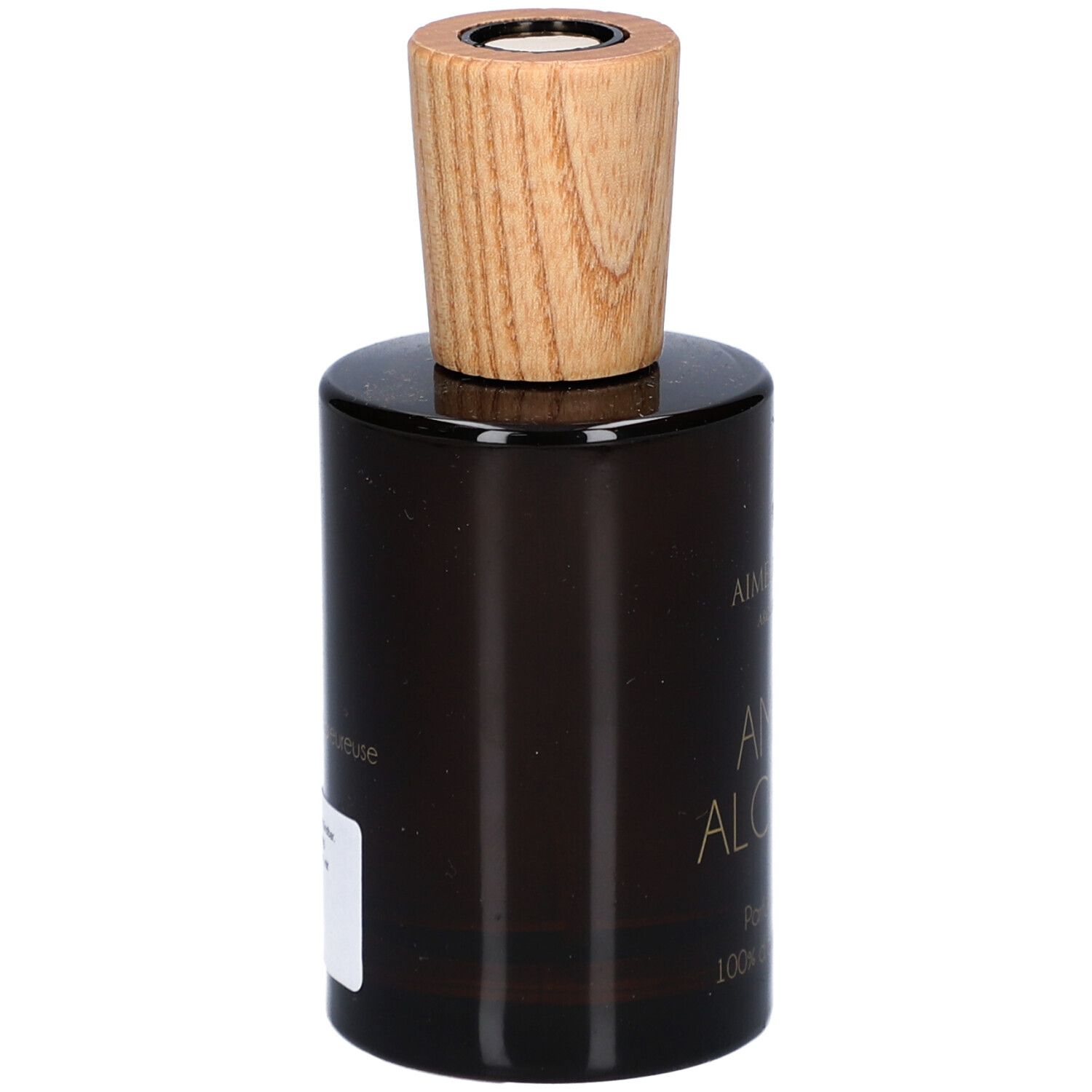 Bruine glazen fles met houten dop. Etiket op de zijkant. Merk: Aimée de Mars. Productnaam: AMBRE ALCHEMIA.