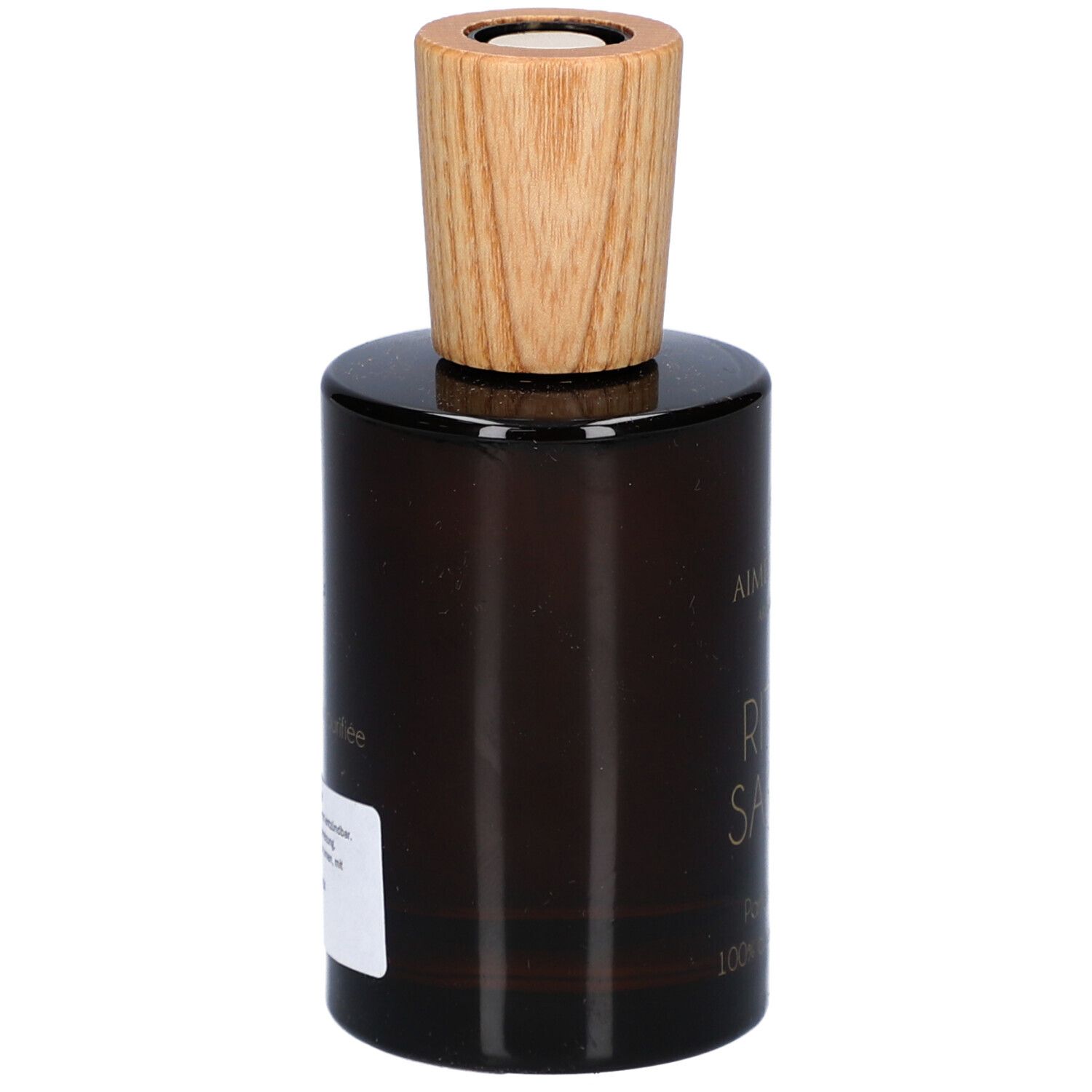 Bruine glazen fles met houten dop. Etiket met tekst aan de zijkant. Merk: Aimée de Mars.