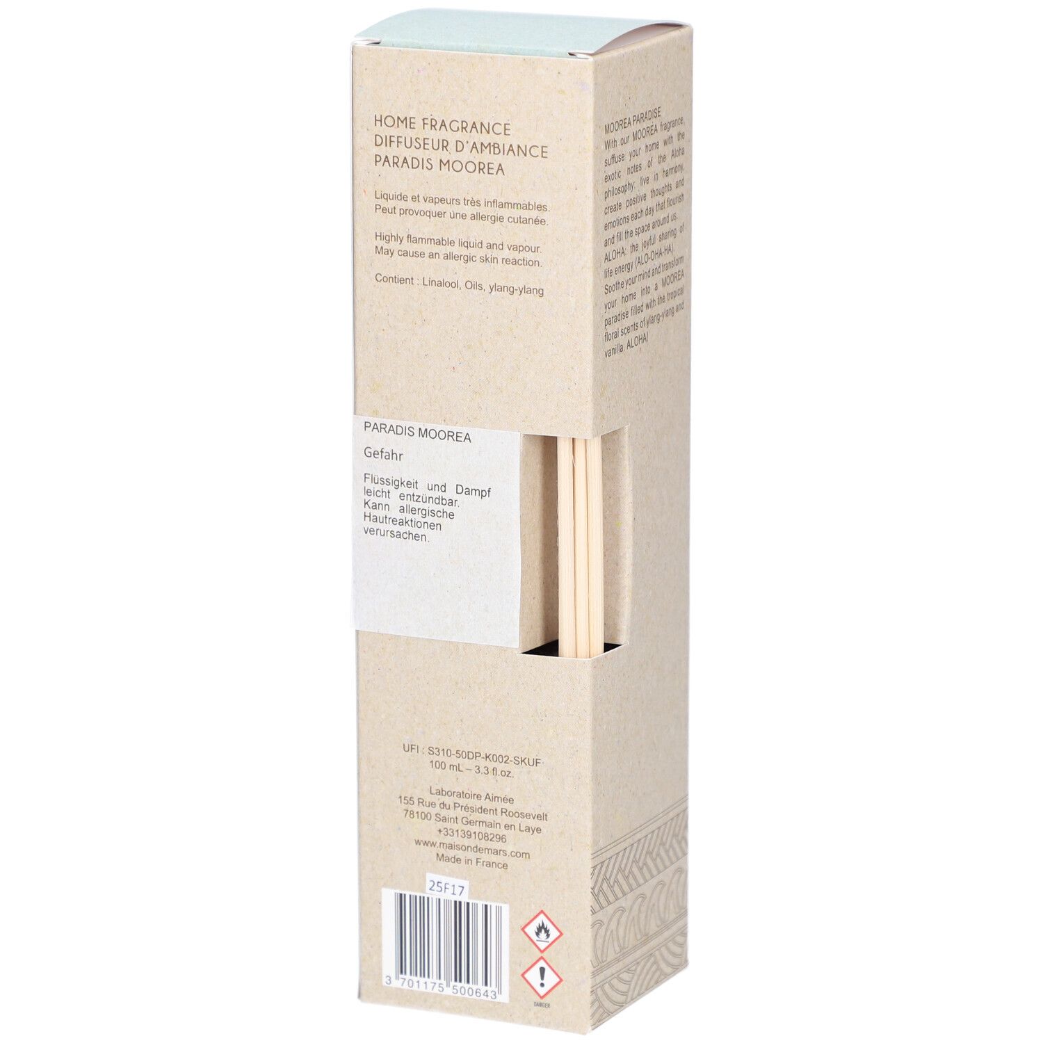 Achterkant van de productverpakking met tekst en waarschuwingen. Bevat houten stokjes. Beige en lichtblauwe tinten.
