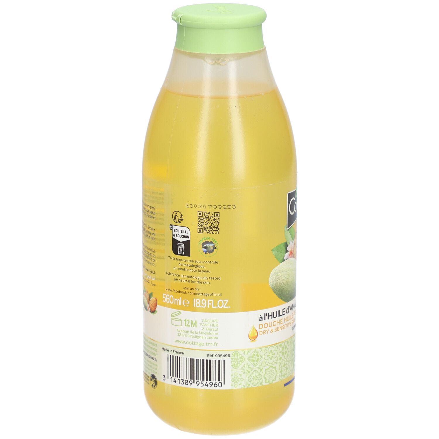Dos du flacon de douche Cottage. Liquide jaune. Texte et logos. Bouchon vert. 560ml. 12M. Emballage recyclable.