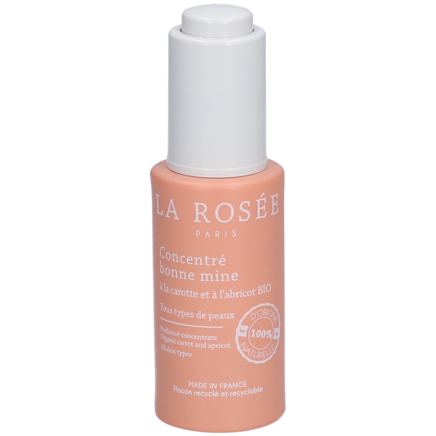 Roze fles met witte dop. Opschrift: LA ROSÉE, Concentré bonne mine, à la carotte et à l'abricot BIO. 100% naturel.