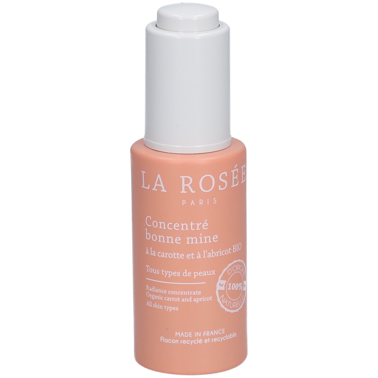 Roze fles met witte dop. Opschrift: LA ROSÉE, Concentré bonne mine, à la carotte et à l'abricot BIO. 100% naturel.