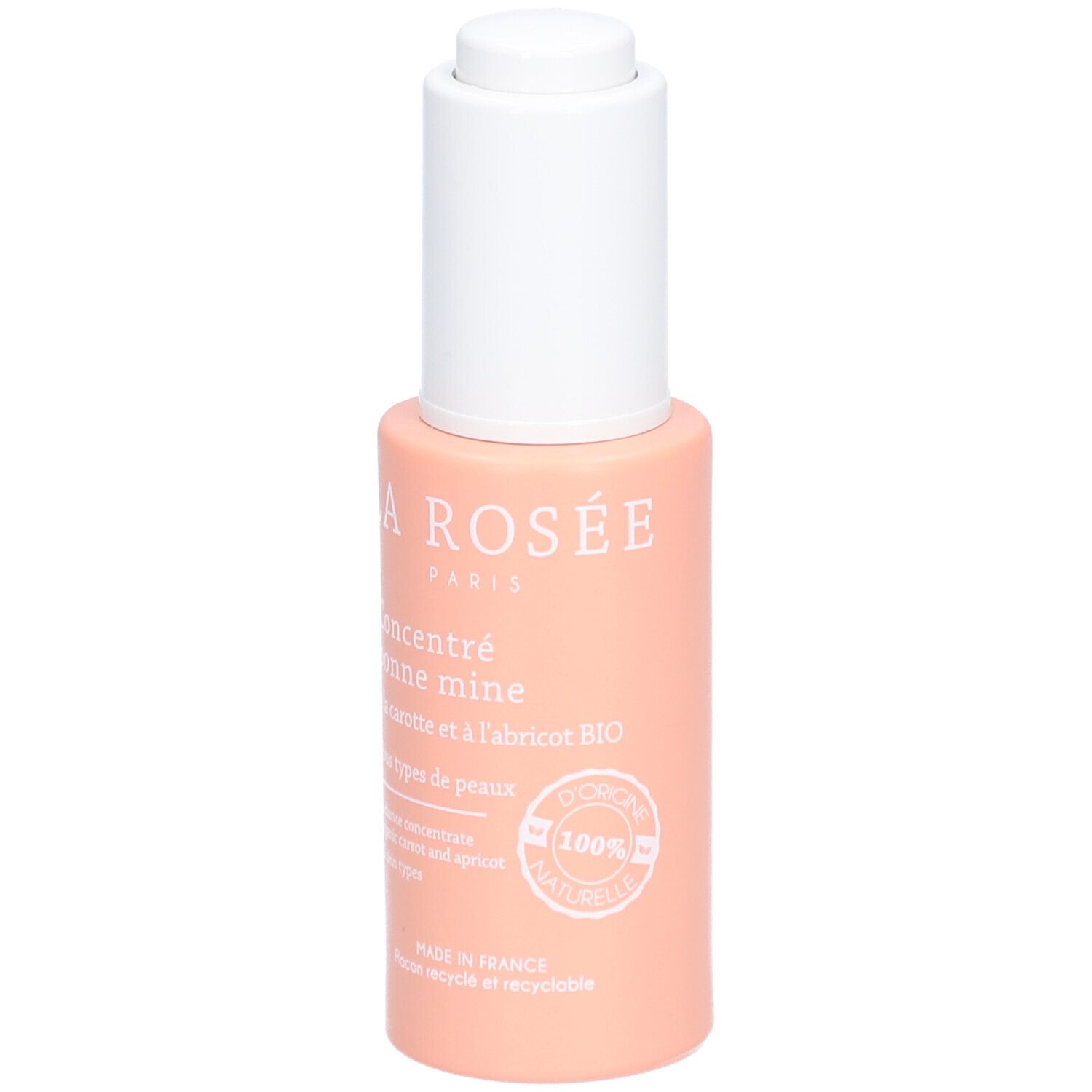 Roze fles met witte dop. Opschrift: LA ROSÉE, Concentré bonne mine, à la carotte et à l'abricot BIO. 100% naturel.