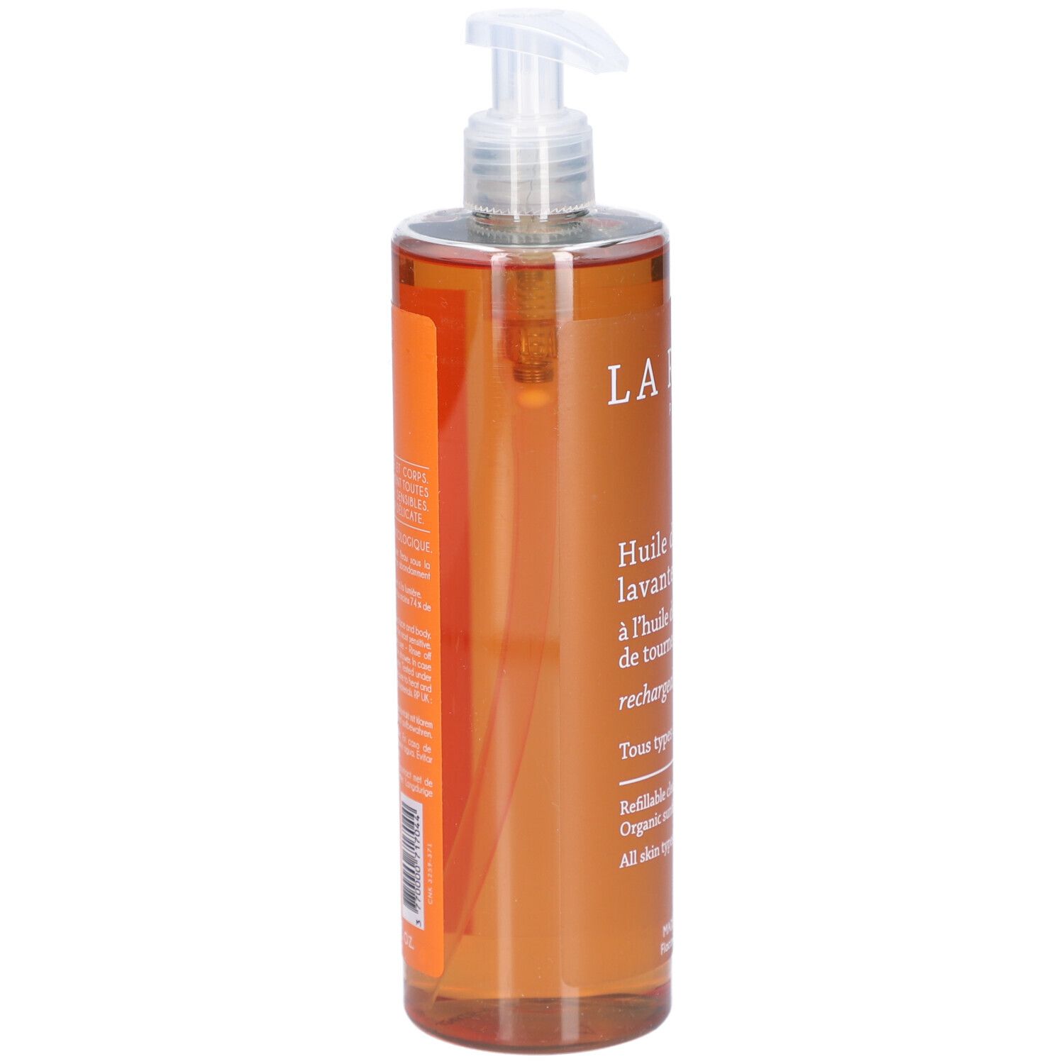 Transparante fles met oranje vloeistof en doseerpomp. Opschrift: La Rosée, Huile de douche lavante.