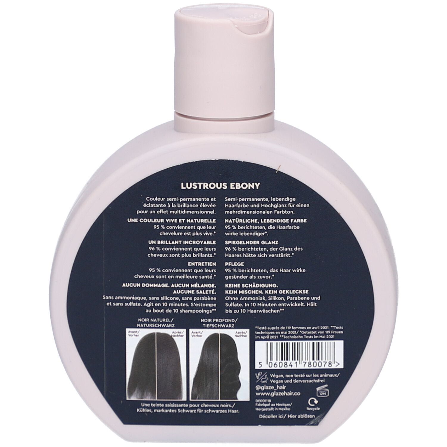 Ronde fles, roze dop. Achterkant met tekst en productinfo. 'Lustrous Ebony'. Twee afbeeldingen van haar. Streepjescode en logo's.