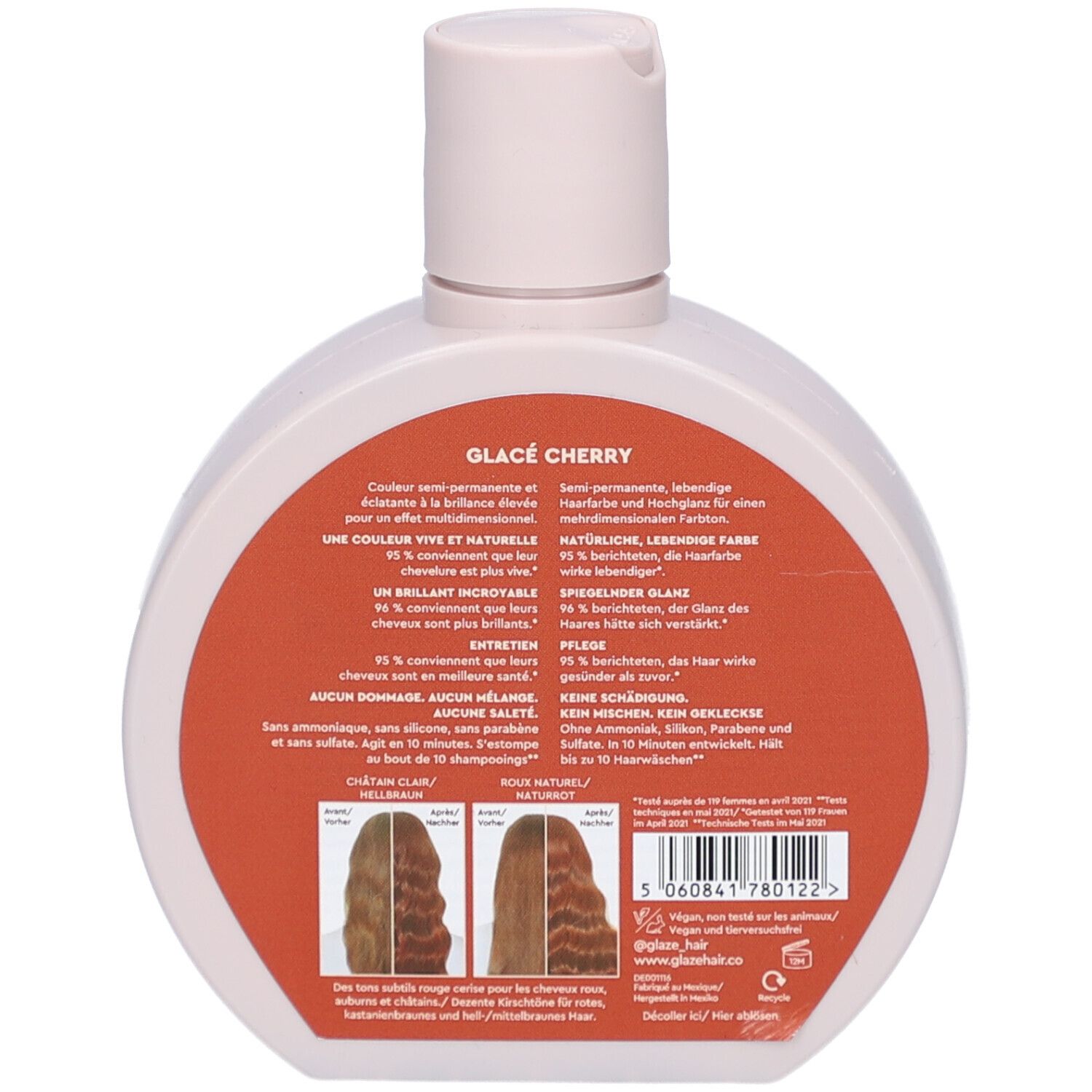 Achterkant van de fles. Rode sticker met meertalige tekst. Twee haar illustraties. Streepjescode.