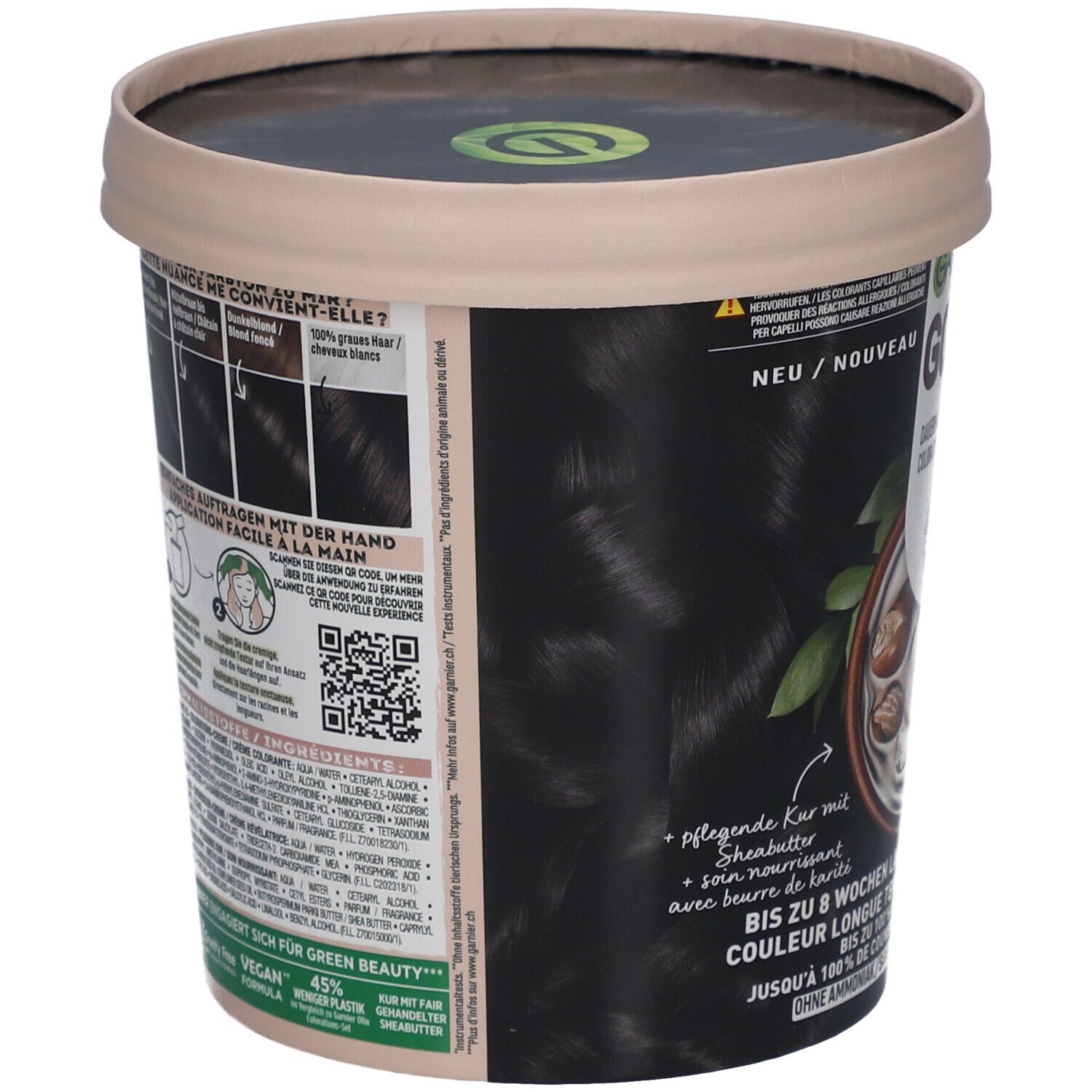 Achterkant van de haarkleurverpakking. Tekst en illustraties. Vegan logo. Ingrediënten en gebruiksaanwijzing.